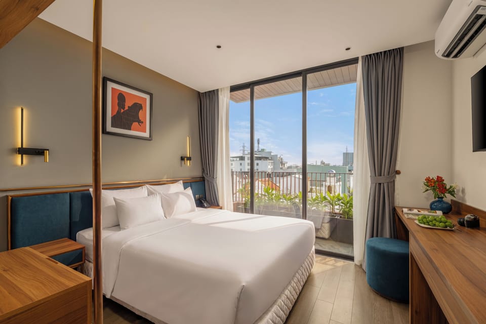 Deluxe Studio, City View | In-room safe, desk, laptop workspace, blackout drapes