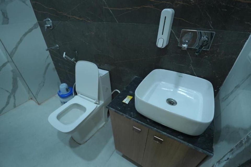 Shower, free toiletries, slippers, towels