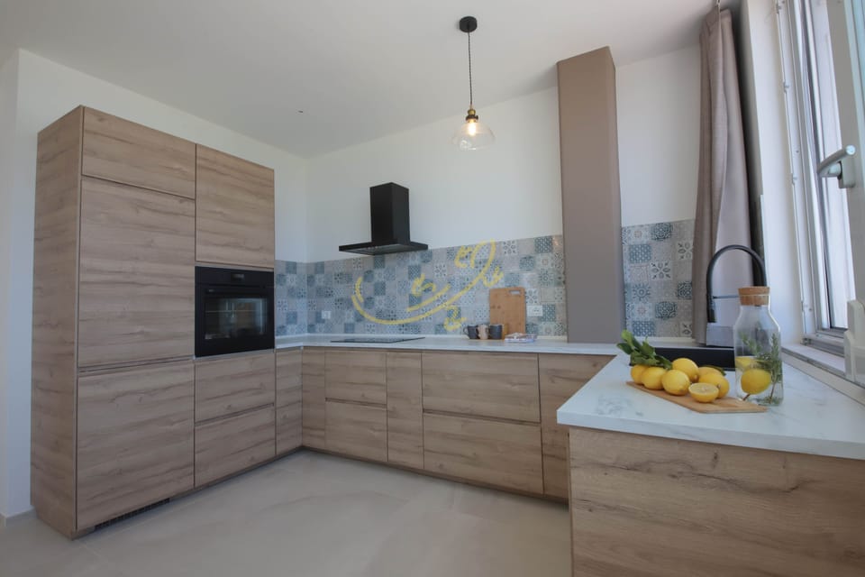 Villa (5 Bedrooms) | Private kitchen | Oven, electric kettle, highchair