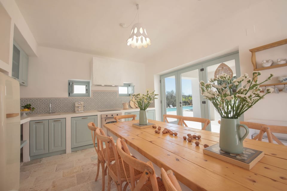 Villa (4 Bedrooms) | Private kitchen | Oven, espresso maker, electric kettle, highchair