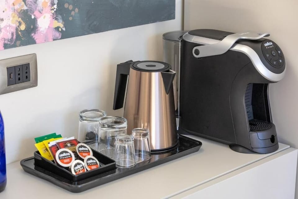 Superior Double Room, City View | Coffee and/or coffee maker