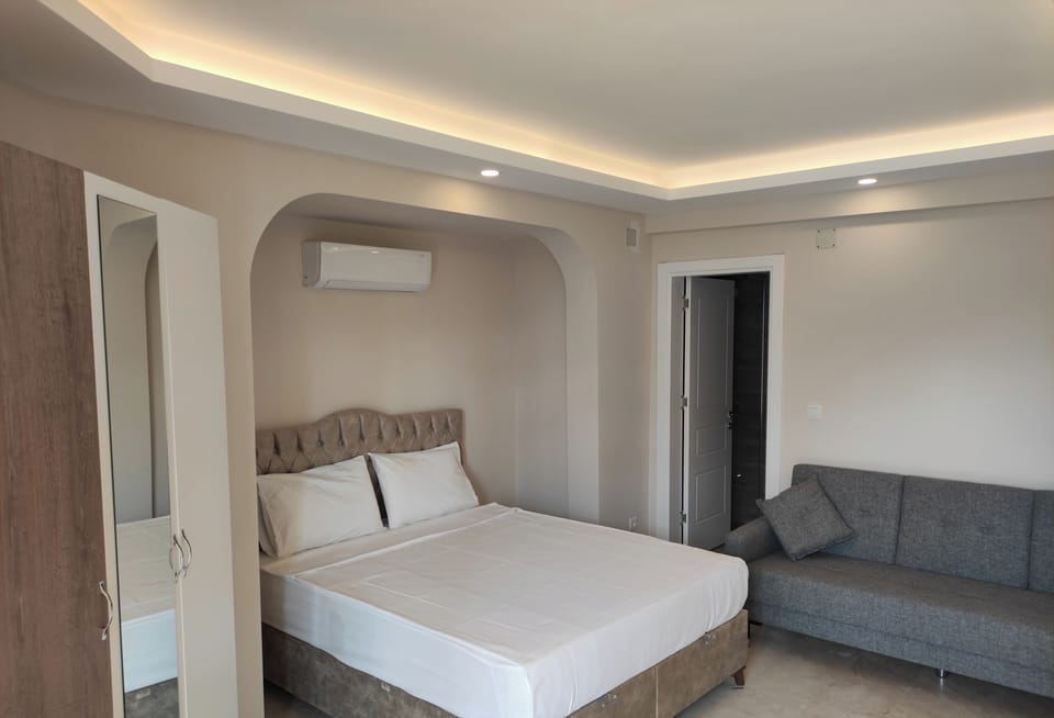 Classic Quadruple Room, Balcony, Partial Sea View | Free WiFi