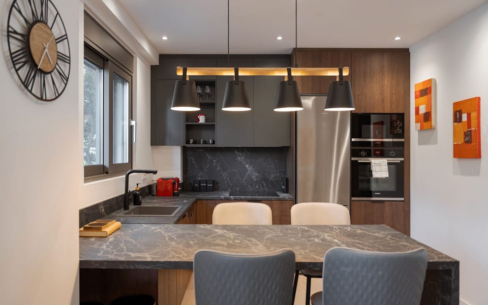 Deluxe Apartment, Balcony | Private kitchen | Espresso maker, coffee/tea maker, full-size fridge, microwave