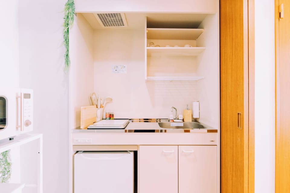 Apartment, Balcony | Private kitchen | Mini-fridge, microwave, stovetop, cookware/dishes/utensils