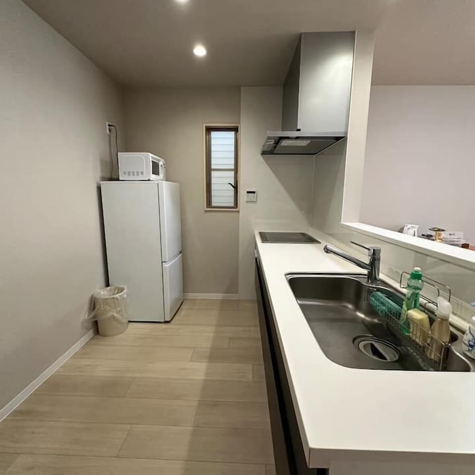 Villa, 4 Bedrooms, Balcony | Private kitchen | Fridge, microwave, stovetop, electric kettle