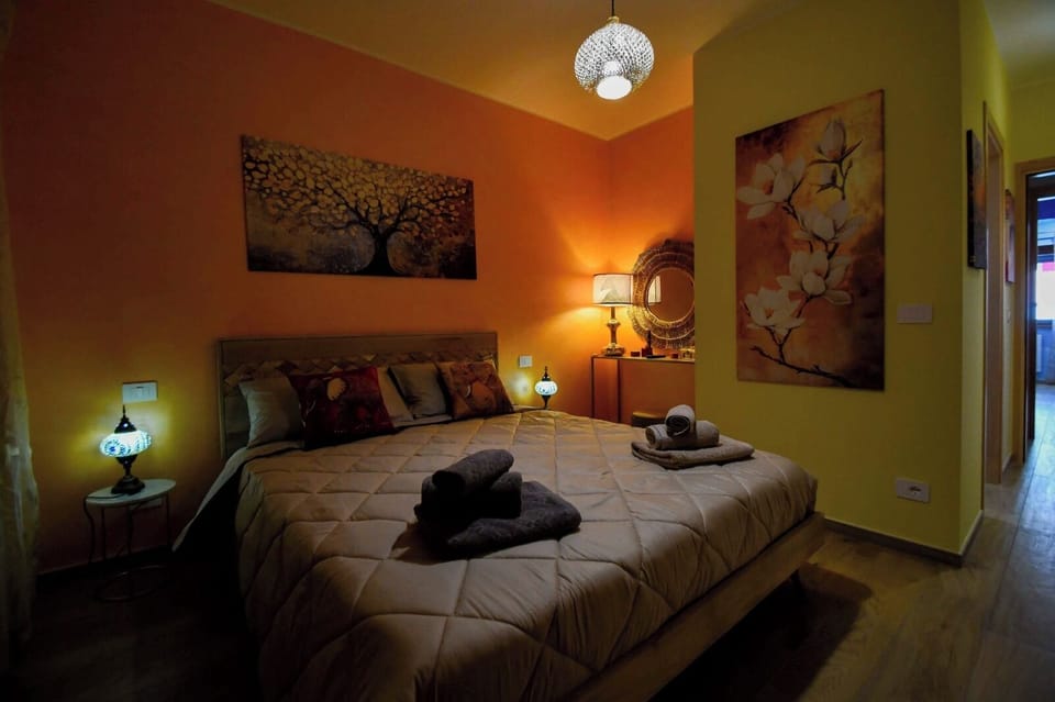 Comfort Apartment | Premium bedding, down comforters, blackout drapes, soundproofing