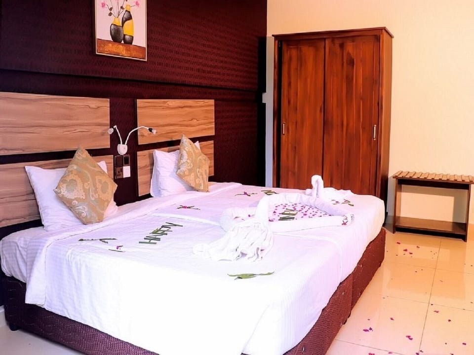 Deluxe Double Room, Balcony, Garden View | Laptop workspace, free WiFi