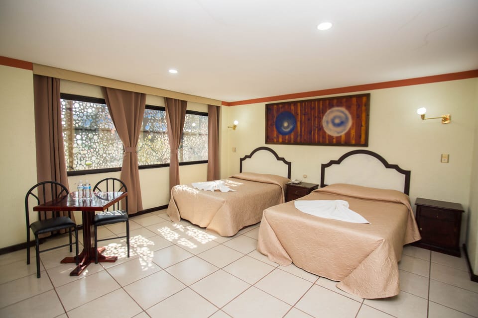 Basic Room, 2 Double Beds | Desk, iron/ironing board, free WiFi