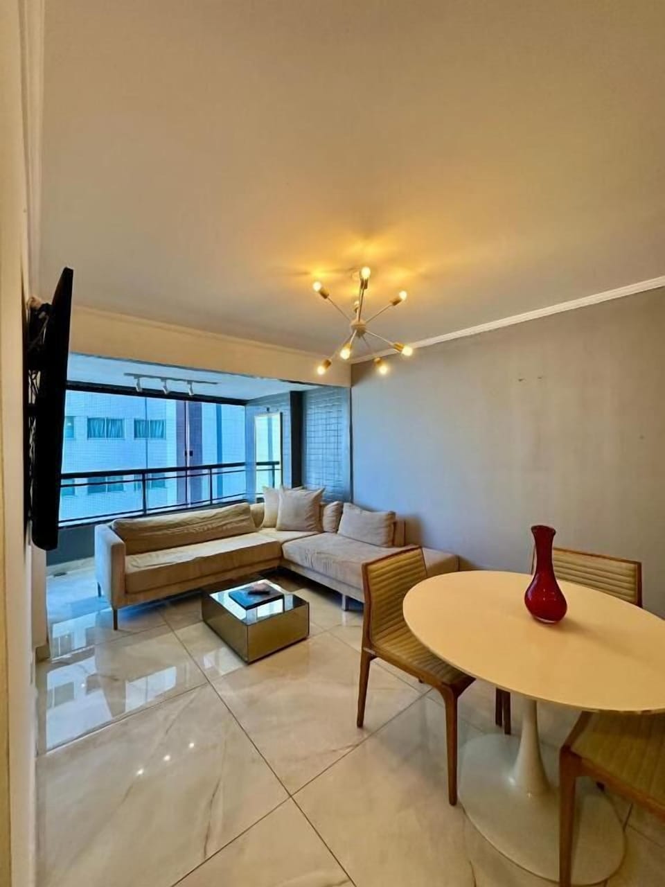 Deluxe Apartment, Partial Ocean View | Living area | Flat-screen TV