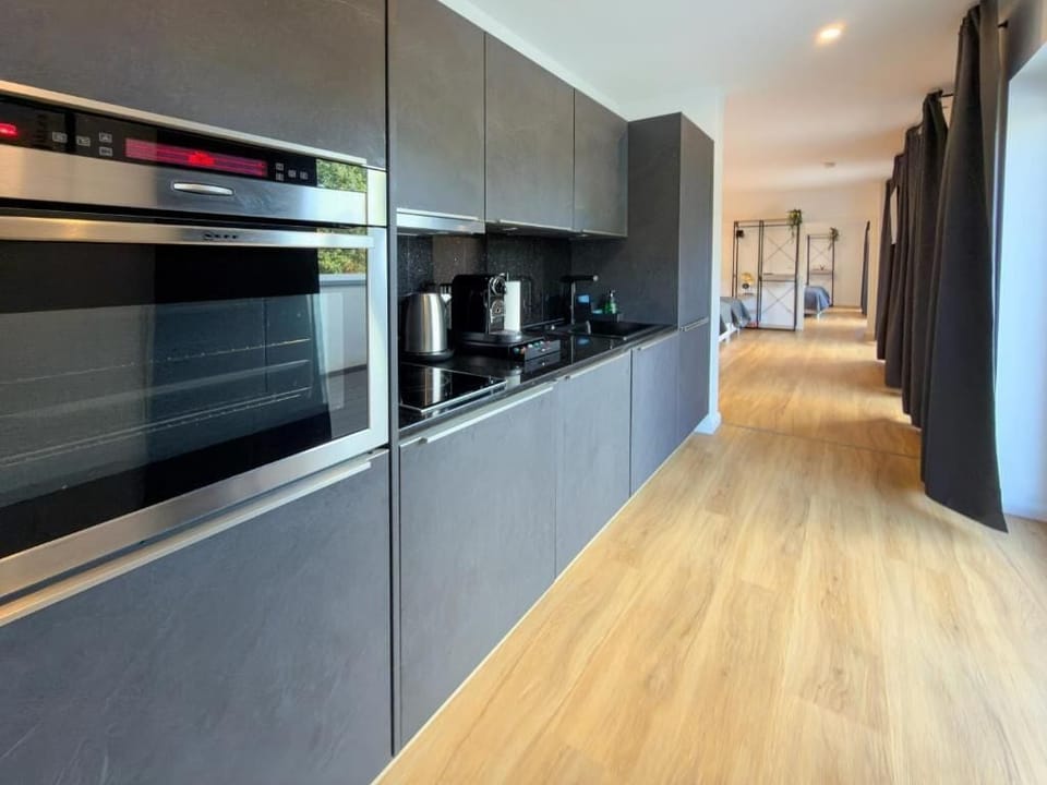 Apartment, 3 Bedrooms, Balcony, Garden View | Private kitchen | Electric kettle, toaster