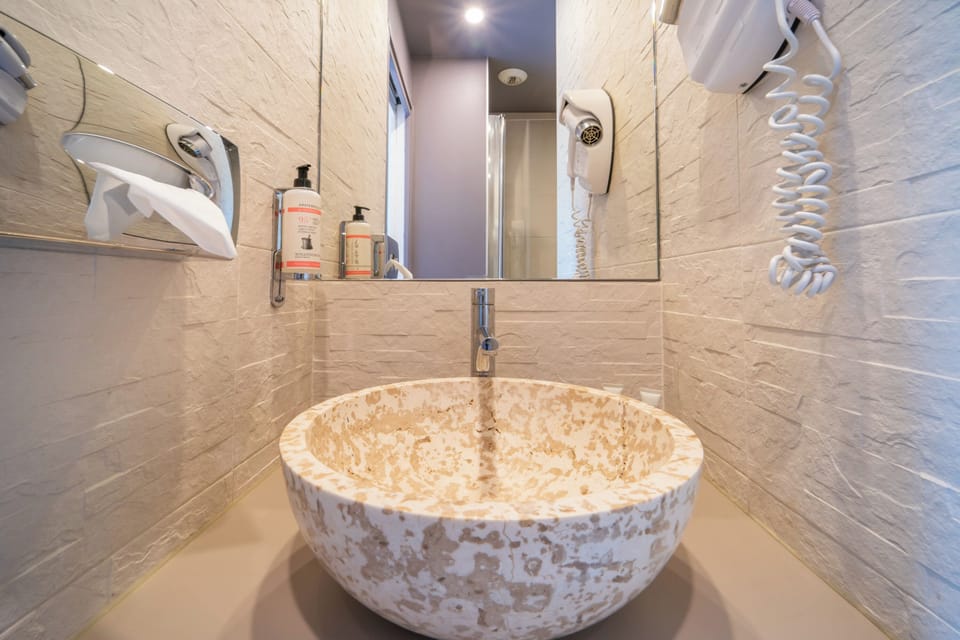 Comfort Double Room, 1 Queen Bed | Bathroom | Hair dryer, bathrobes, towels, soap