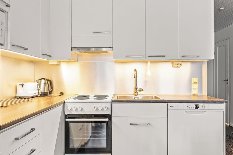 Comfort Apartment, Multiple Beds, Sauna, Courtyard View | Private kitchen | Full-size fridge, microwave, oven, stovetop