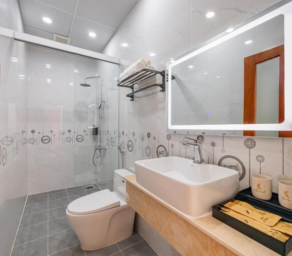 Shower, hydromassage showerhead, designer toiletries, hair dryer