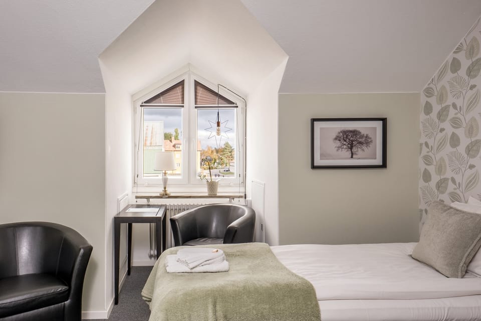 Double or Twin Room | Desk, blackout drapes, iron/ironing board (on request)