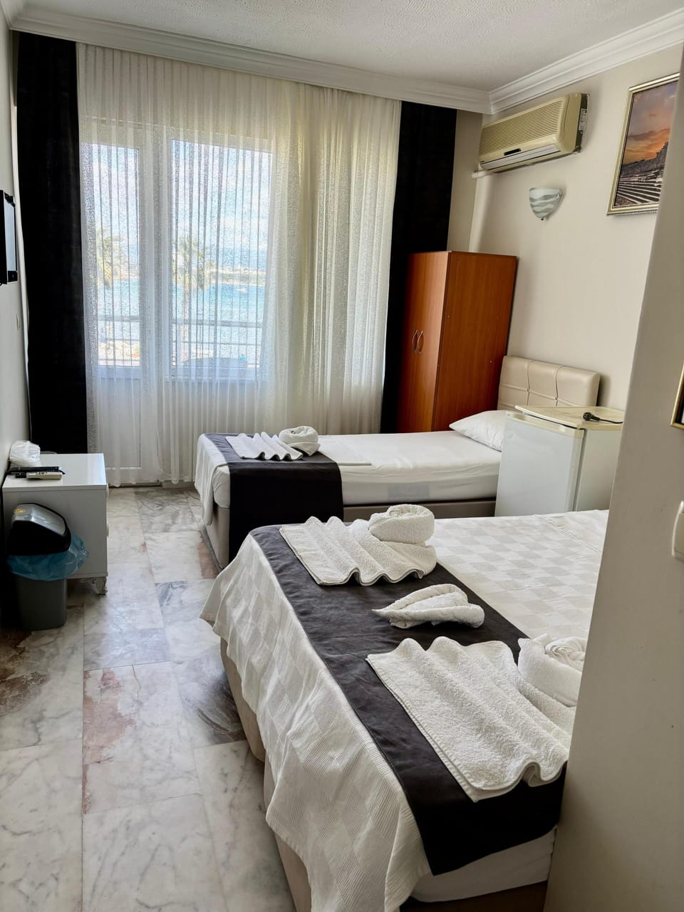Economy Triple Room, Balcony, Beach View | Free WiFi