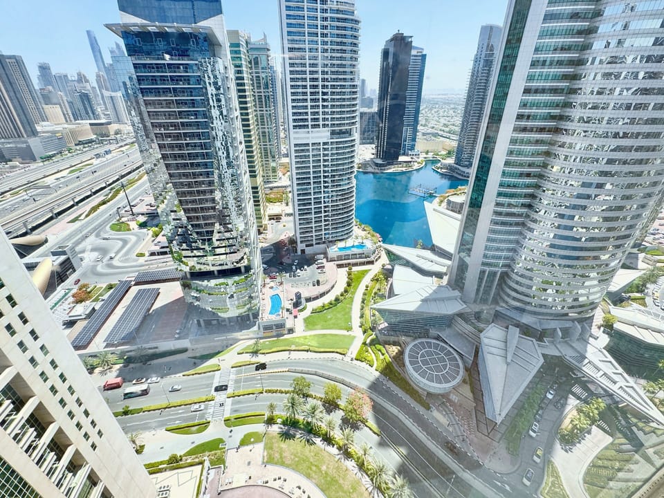 Luxury Apartment, Lake View | In-room safe, blackout drapes, iron/ironing board, free WiFi