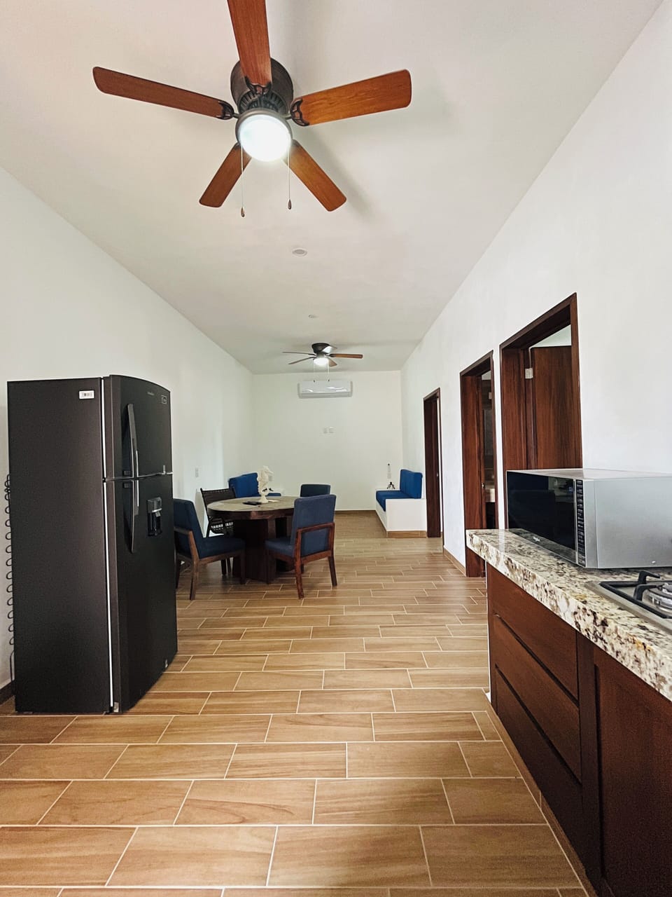 Family Apartment, Non Smoking | Living area | 50-inch Smart TV with satellite channels