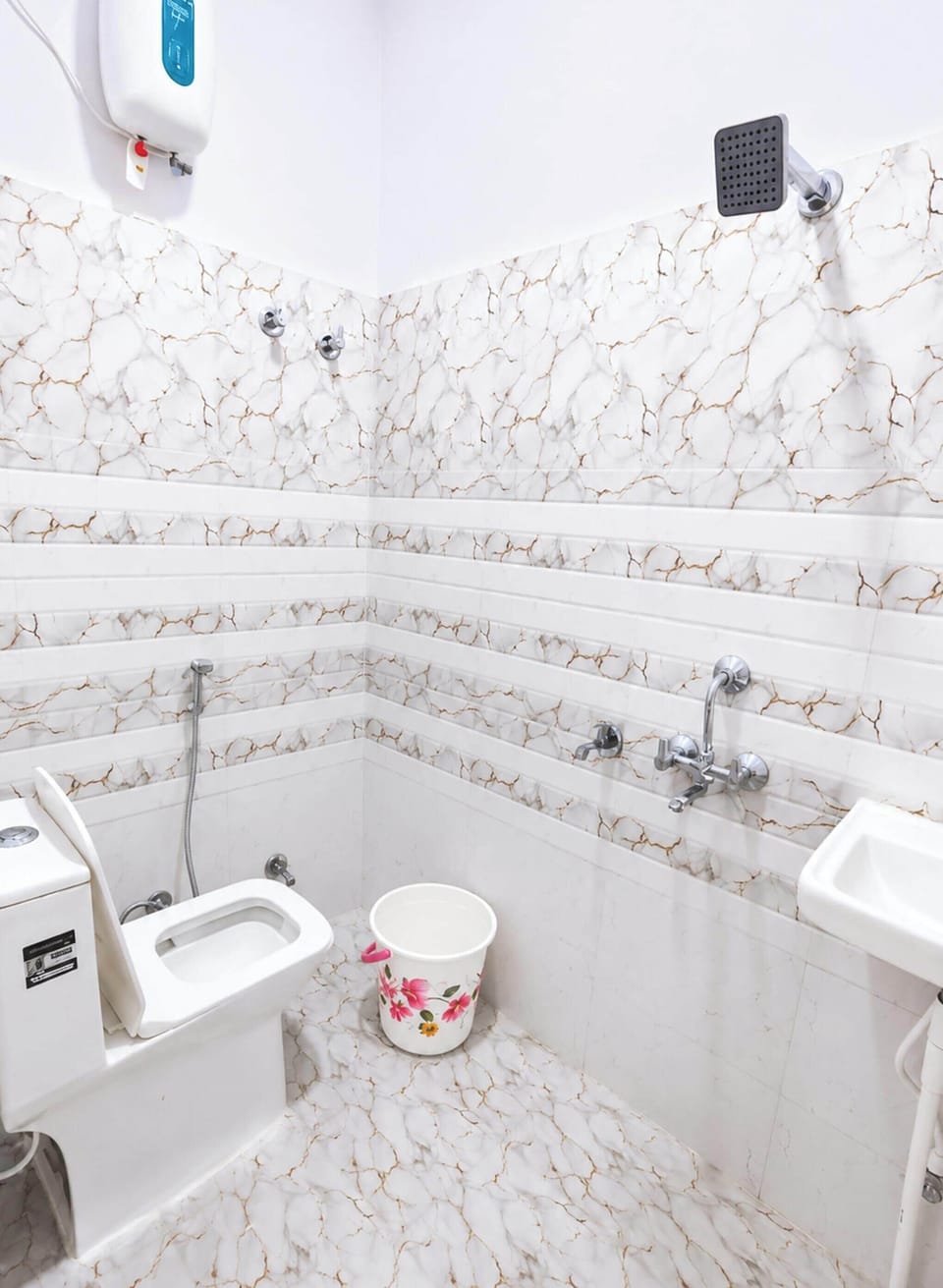 Shower, rainfall showerhead, slippers, towels