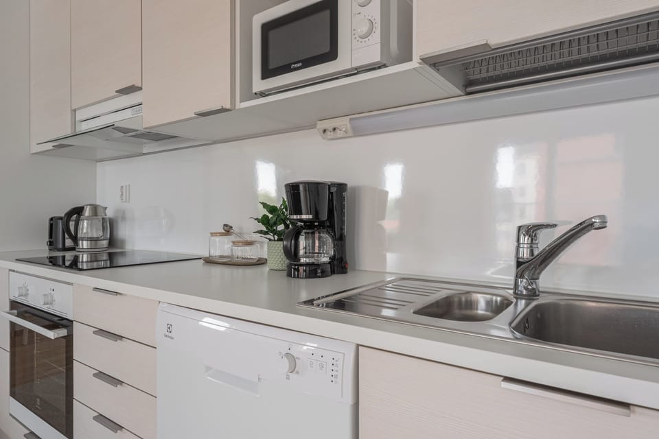 Comfort Apartment, 2 Bedrooms, Sauna | Private kitchen | Full-size fridge, microwave, stovetop, coffee/tea maker