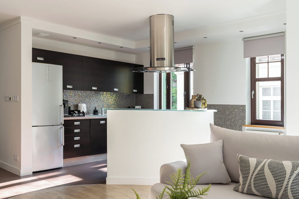 Family Apartment, Non Smoking, Private Bathroom | Living area | 40-inch flat-screen TV with cable channels