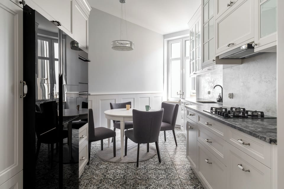 Apartment, Balcony, City View | Private kitchen | Coffee/tea maker, electric kettle, highchair, freezer