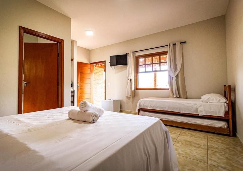 Family Quadruple Room, Lanai, Garden View | Desk, laptop workspace, free WiFi, bed sheets