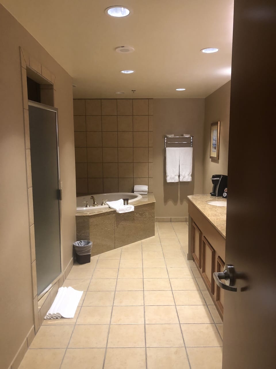 Shower, designer toiletries, hair dryer, towels