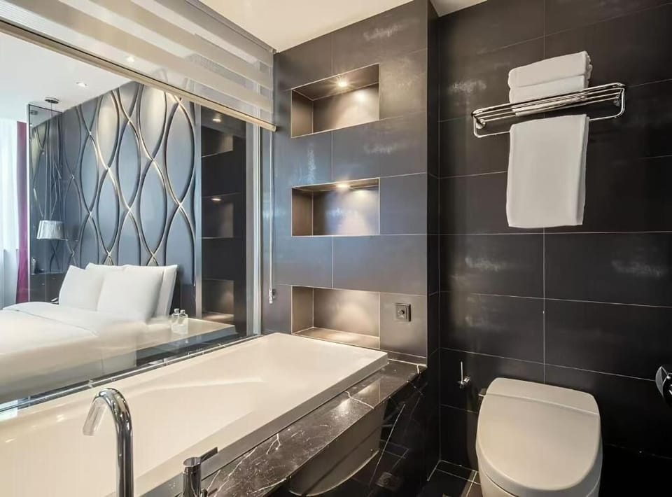 Superior Single Room | Bathroom | Bathrobes, slippers