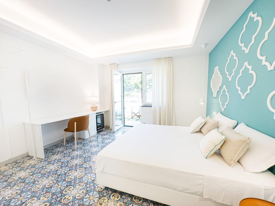 Deluxe Double Room, Terrace, Sea View | In-room safe, desk, soundproofing, iron/ironing board (on request)