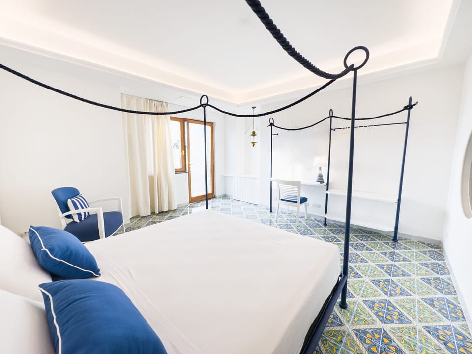 Deluxe Double Room, Terrace, Sea View | In-room safe, desk, soundproofing, iron/ironing board (on request)