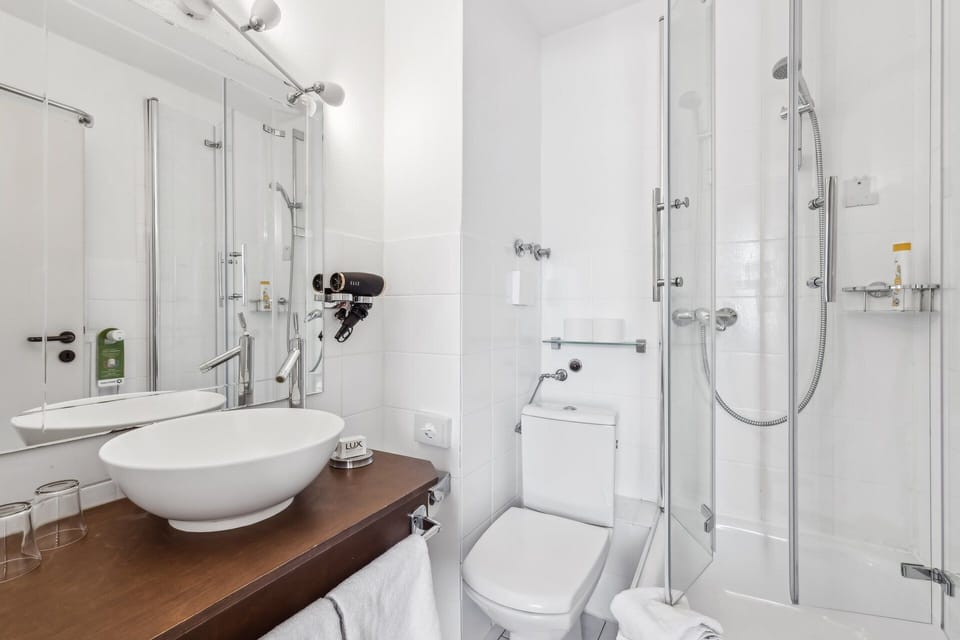 Shower, free toiletries, hair dryer, towels