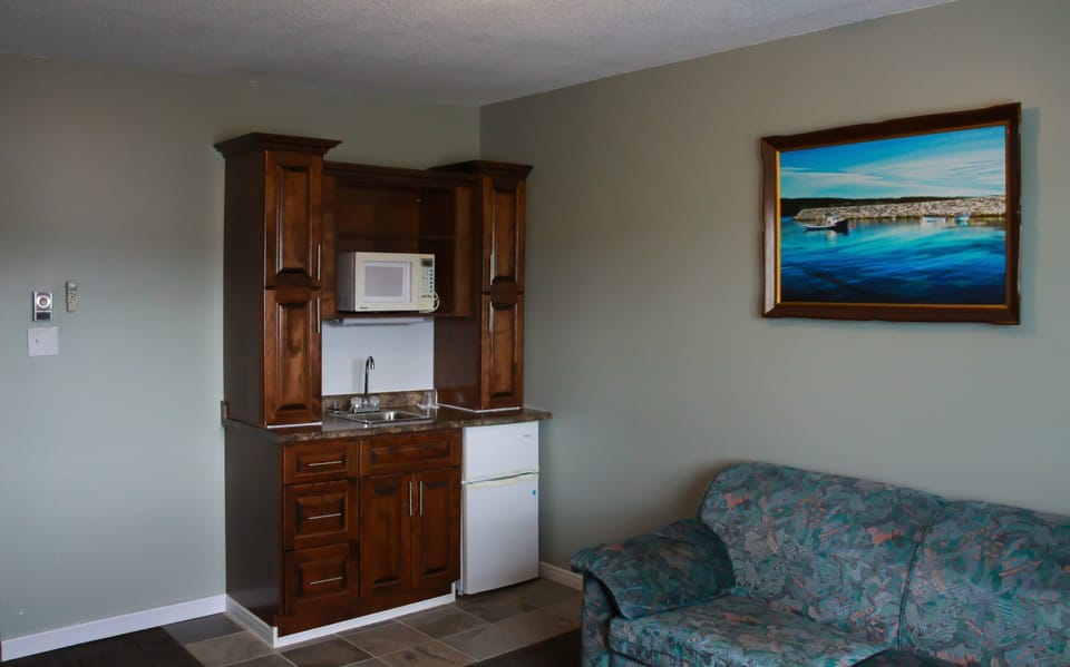 Suite, 1 Queen Bed with Sofa bed (Hotel) | Private kitchenette | Coffee/tea maker