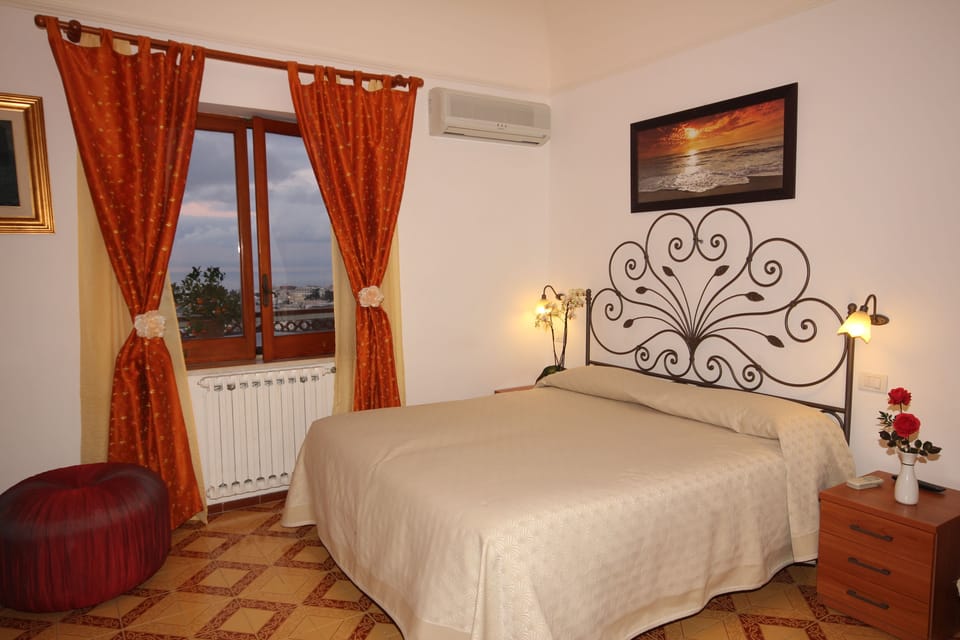 Double or Twin Room, Sea View | Free cribs/infant beds, free WiFi, bed sheets