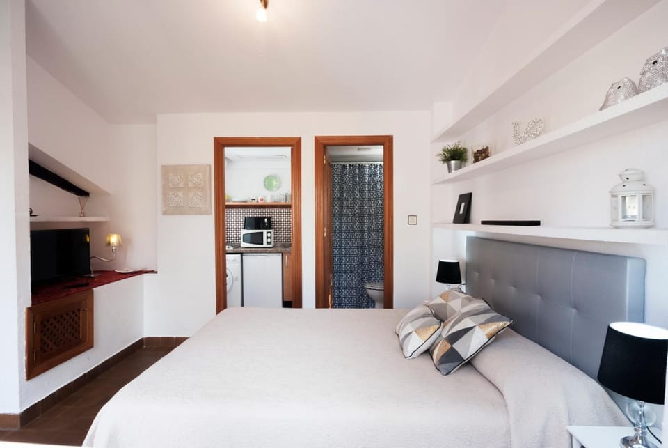 City Penthouse, Terrace | Down comforters, memory foam beds, minibar, desk