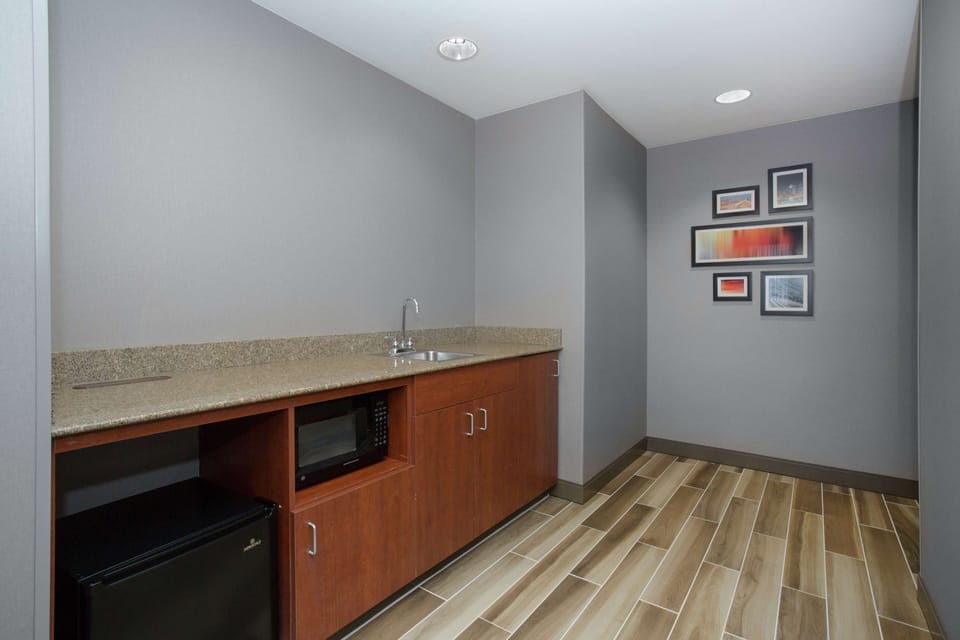 Two Queen Studio Suite | Private kitchen | Fridge, microwave, coffee/tea maker