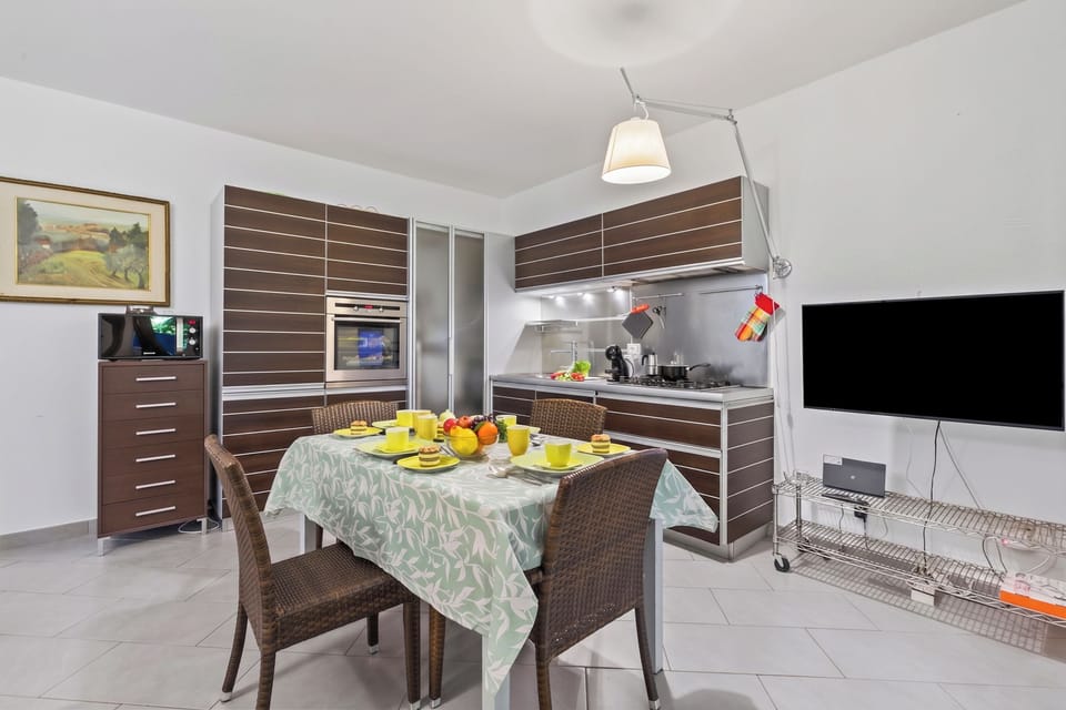 Family Apartment, 2 Bedrooms, Microwave (Maison Clélie - 200 M From Sea) | Dining