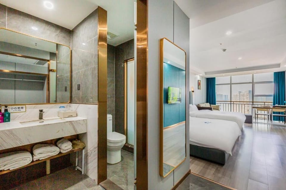 Comfort Quadruple Room, City View | Bathroom | Slippers