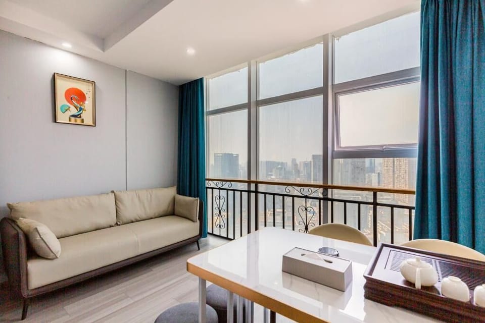 Comfort Quadruple Room, City View | Living area | Printers