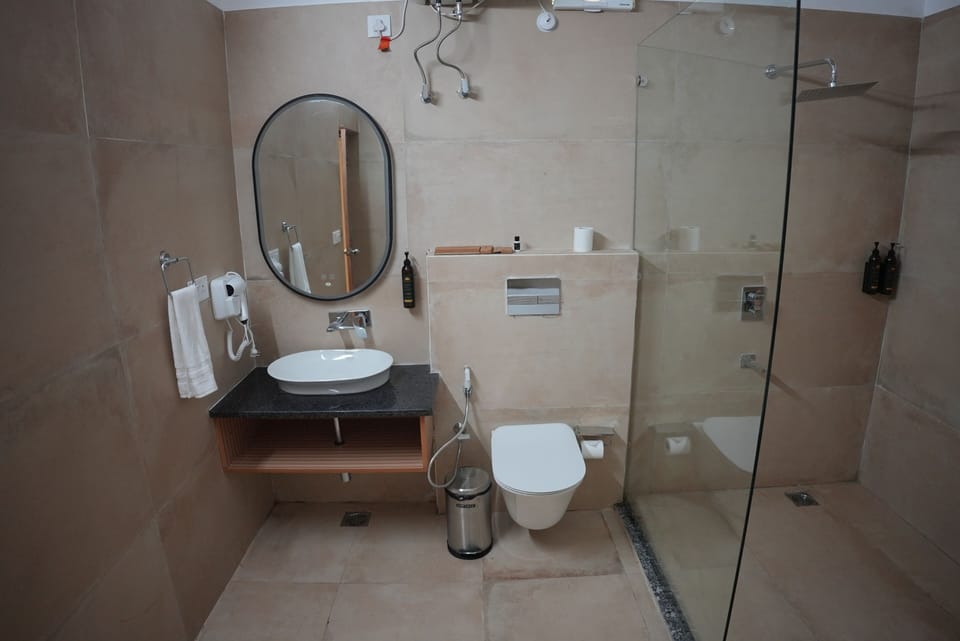 Premium Room, Balcony, Hill View | Bathroom | Shower, hair dryer, slippers, towels