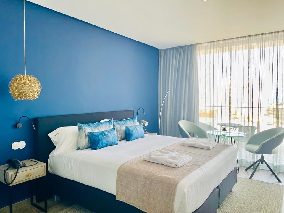 Deluxe Double Room, City View | In-room safe, desk, laptop workspace, soundproofing
