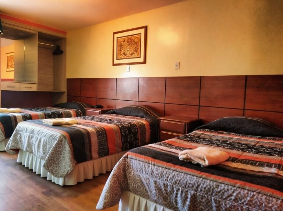 Family Room | Premium bedding, iron/ironing board (on request), WiFi (free)