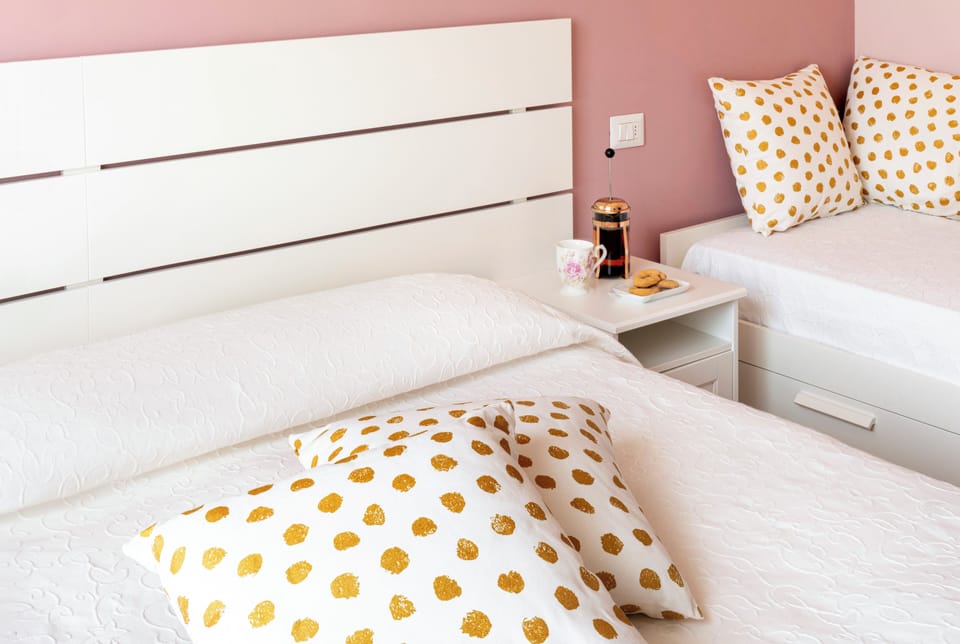 Triple Room, Garden View | Desk, WiFi (free), bed sheets