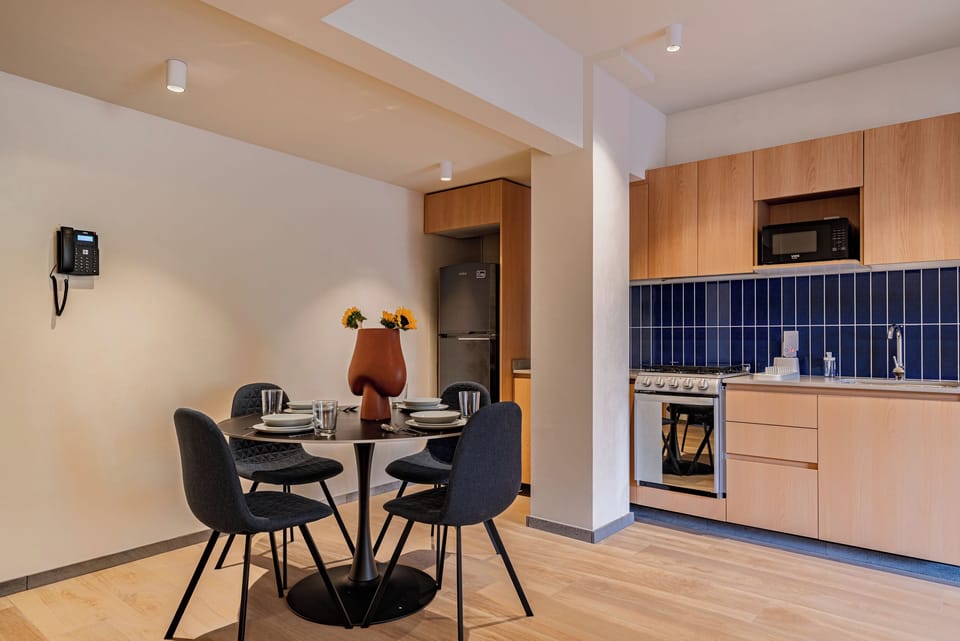 Family Apartment | Private kitchen | Full-size fridge, microwave, oven, stovetop