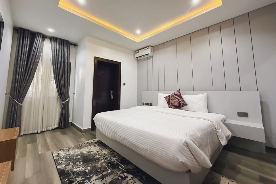 Economy Room, Balcony, City View | Desk, laptop workspace, blackout drapes, soundproofing