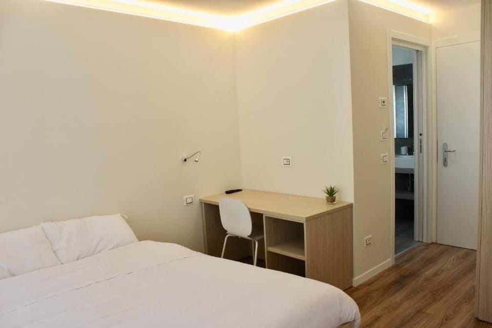 Family Room, Balcony, City View | Free WiFi