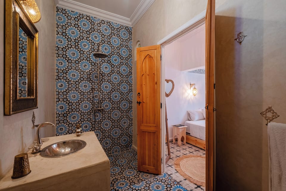 Comfort Double or Twin Room, Courtyard View | Bathroom | Shower, hair dryer, bathrobes, slippers