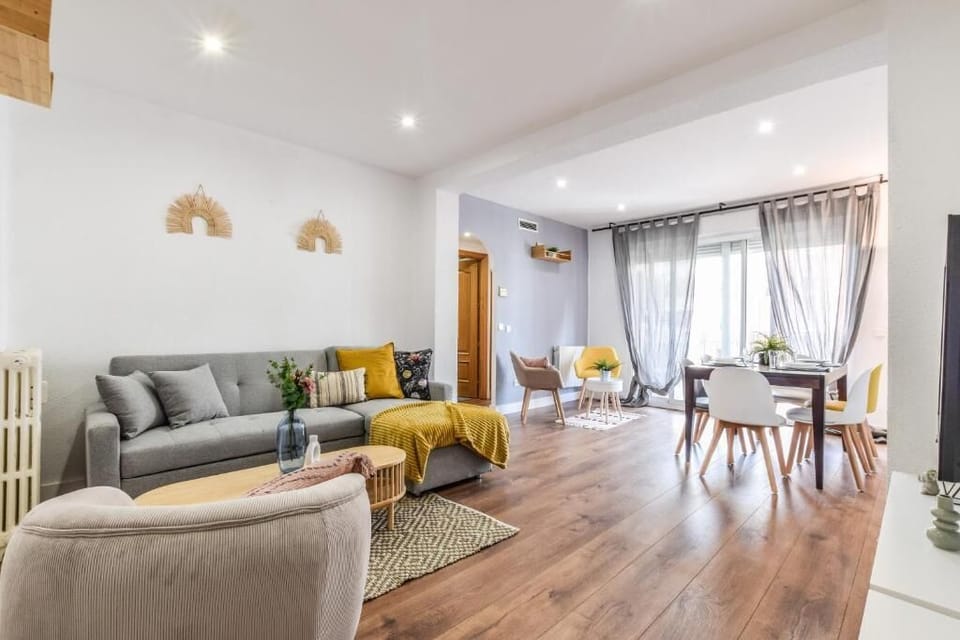 Deluxe Apartment, Balcony | Living area | 32-inch flat-screen TV with cable channels