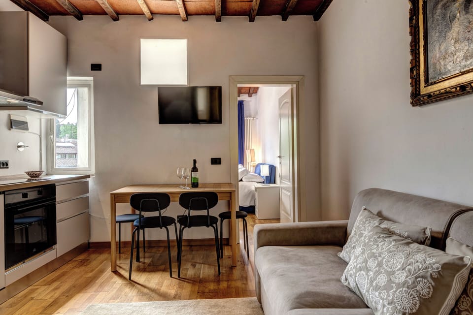 Apartment | Living area | 30-inch flat-screen TV with digital channels