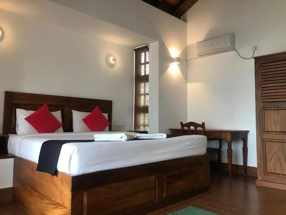 Deluxe Double Room, Balcony, Pool View | In-room safe, laptop workspace, iron/ironing board, free WiFi