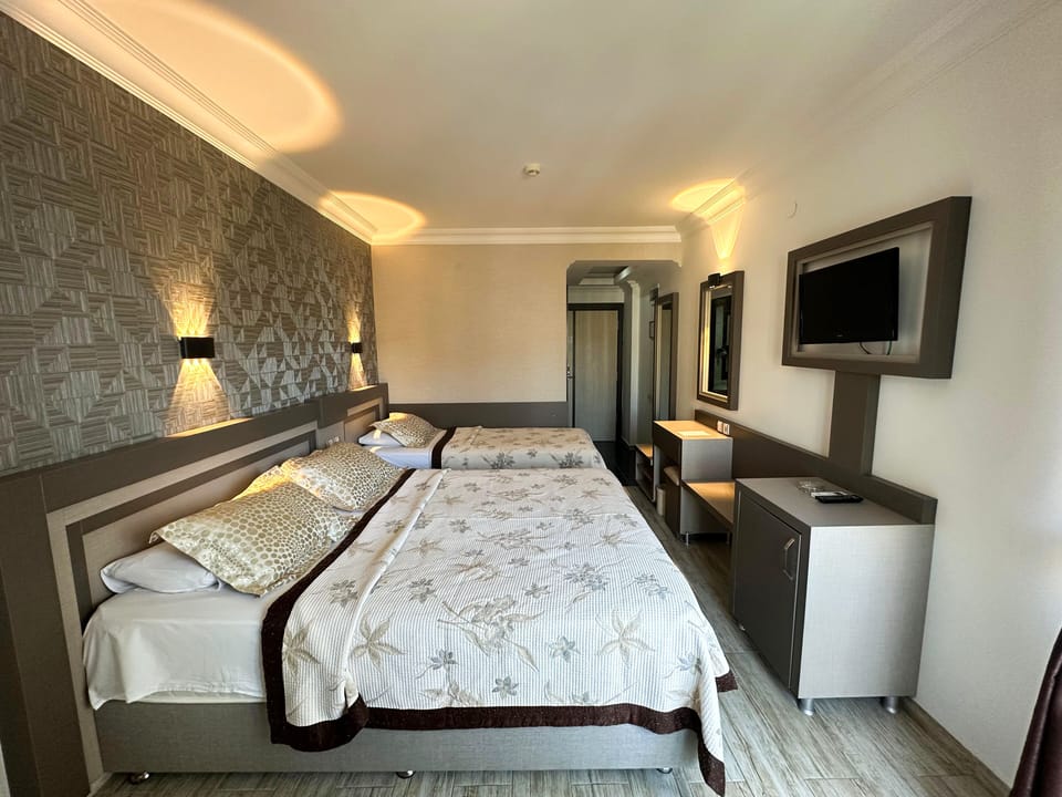 Standard Triple Room | Minibar, free WiFi, wheelchair access